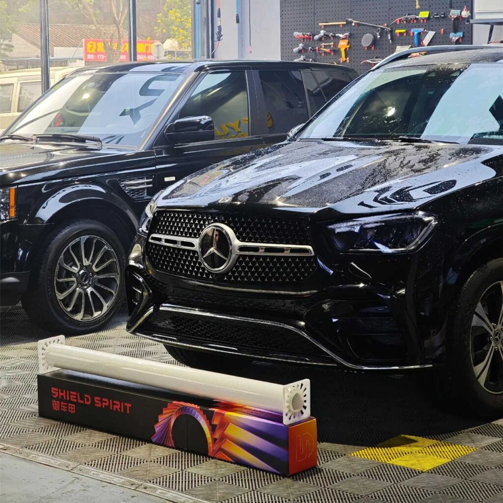 Black coupe hood featuring premium PCU paint protection