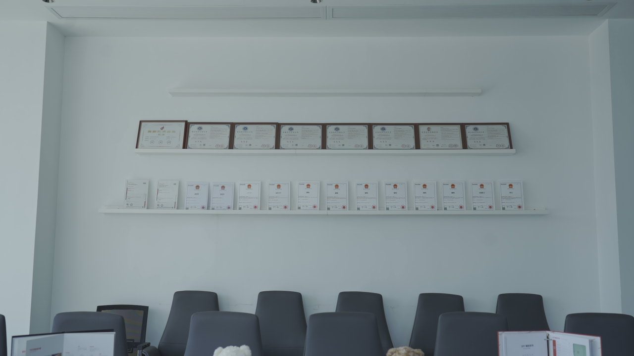 Brochures and mascot bear on meeting room table