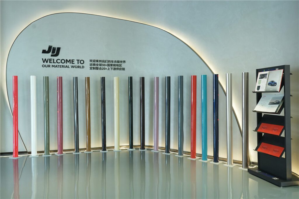 Color wrap film samples on rack at PPF showroom