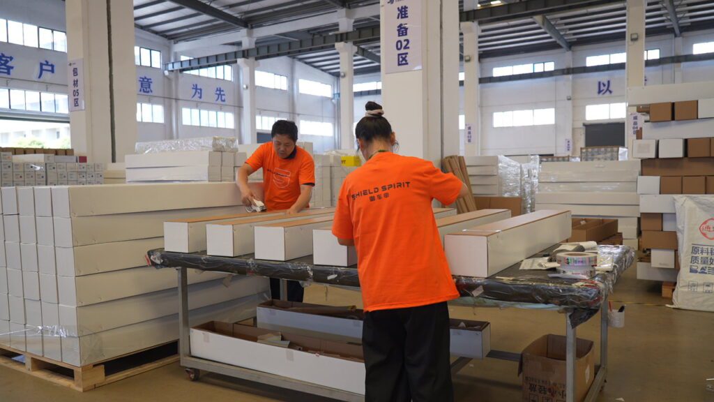 Worker preparing shipment at PPF factory warehouse