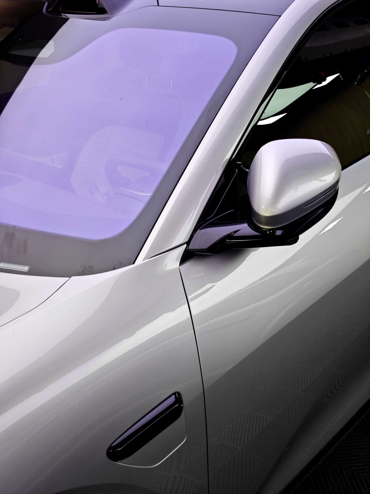 Side mirror and A-pillar area with paint protection film precisely wrapped around complex curves